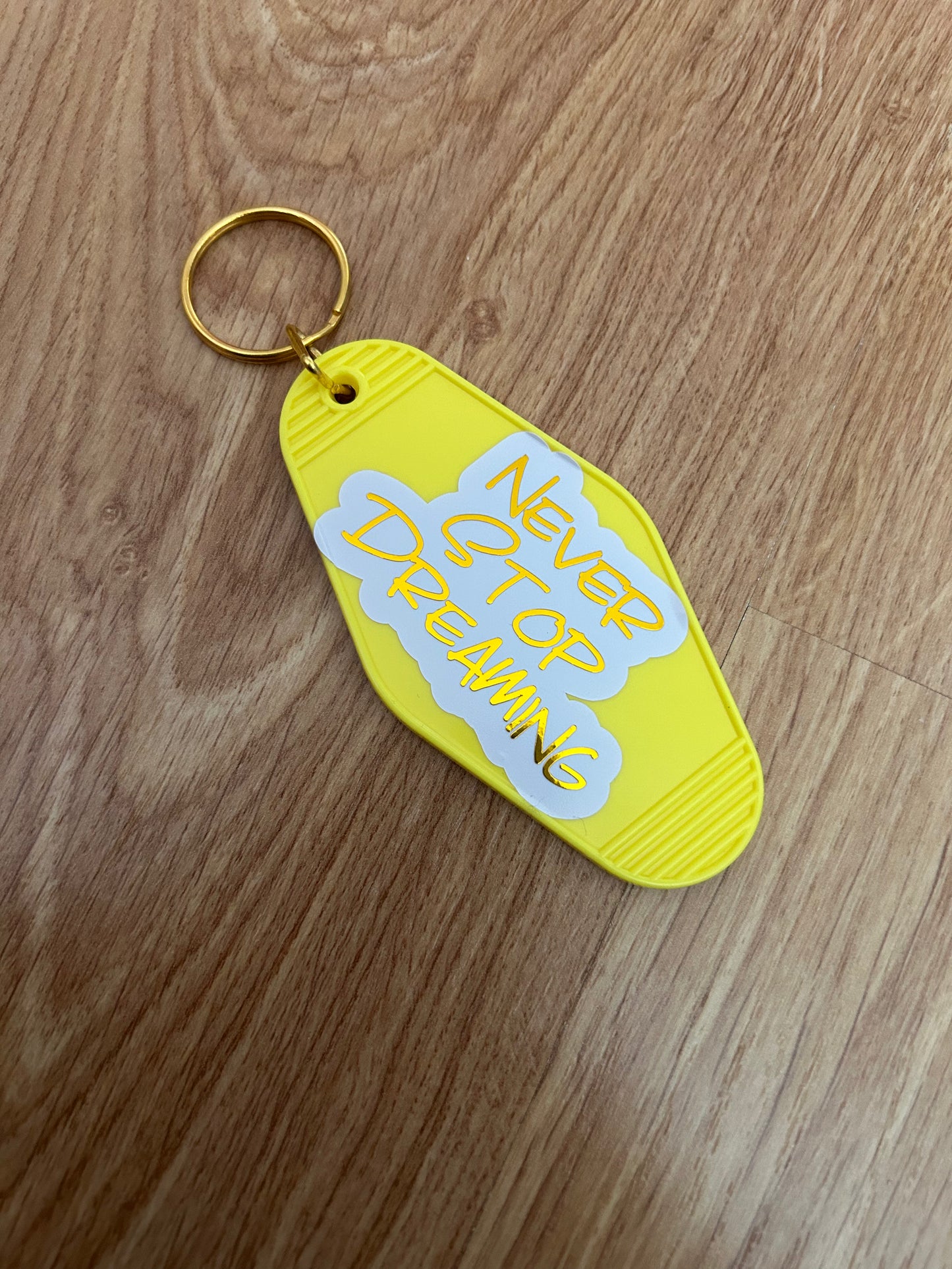 Never Stop Dreaming motel keyring