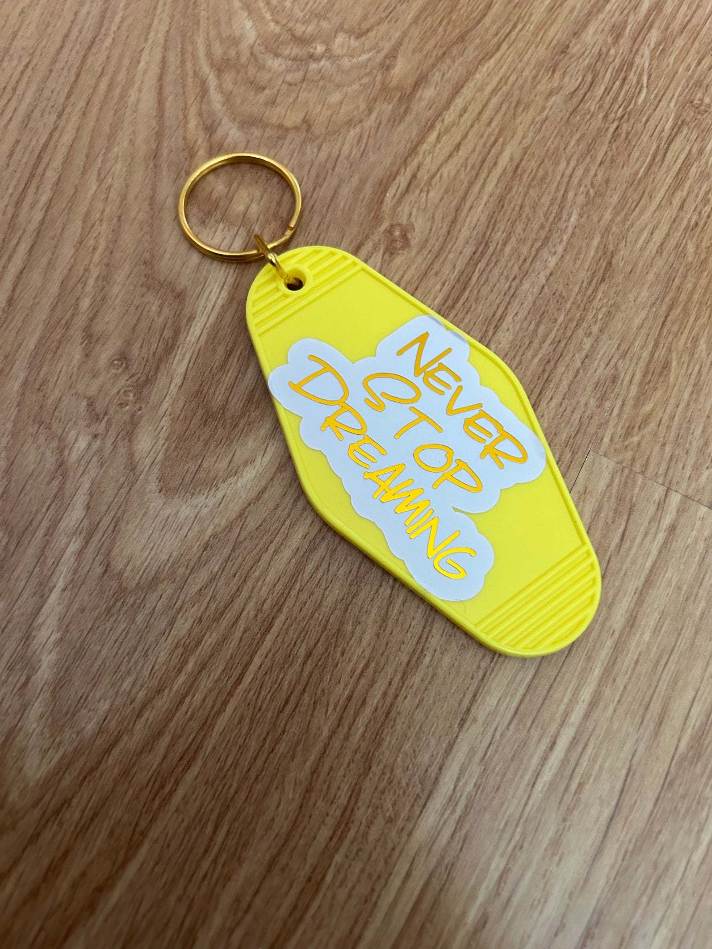 Never Stop Dreaming motel keyring