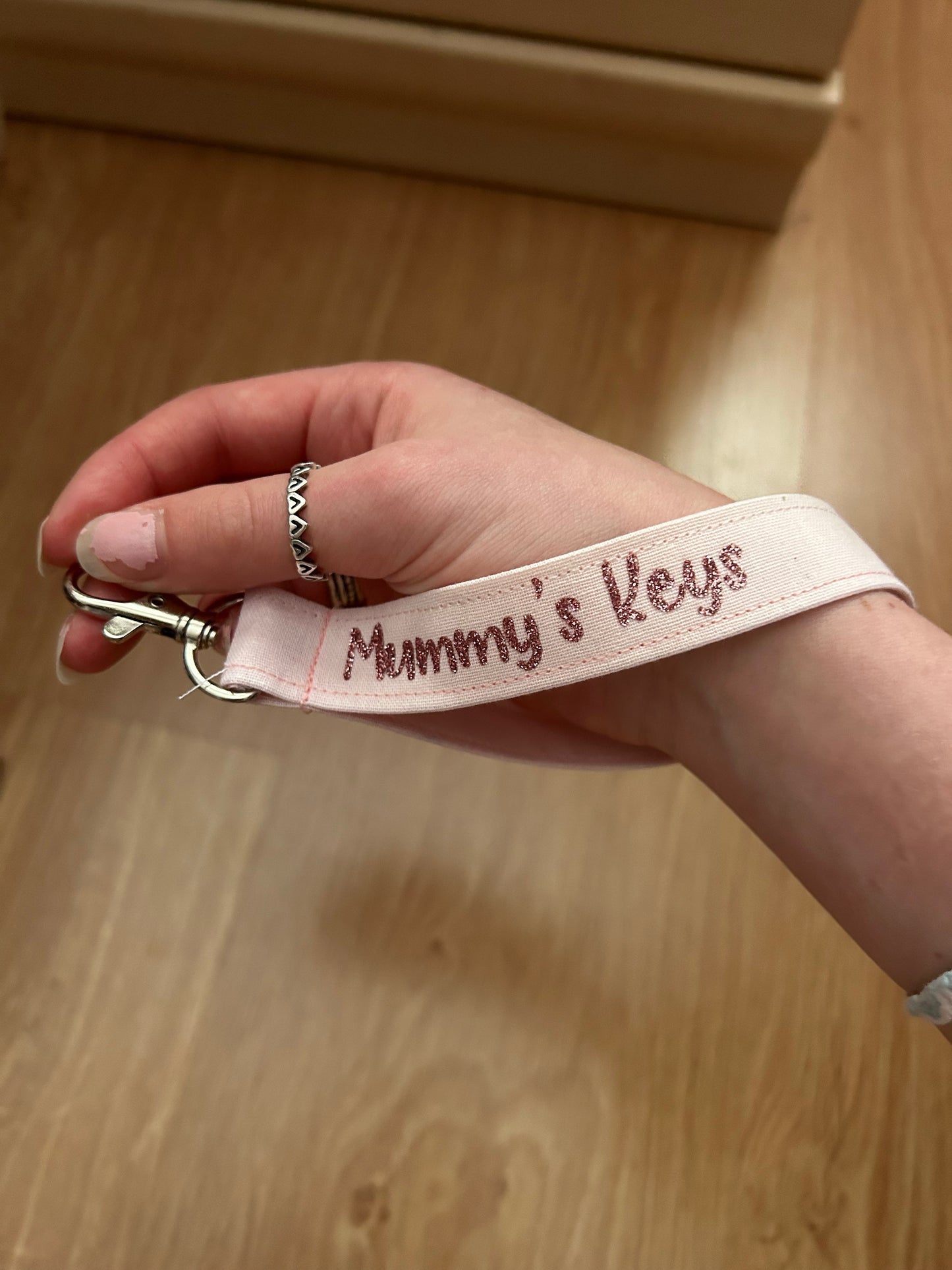 Personalised wristlet