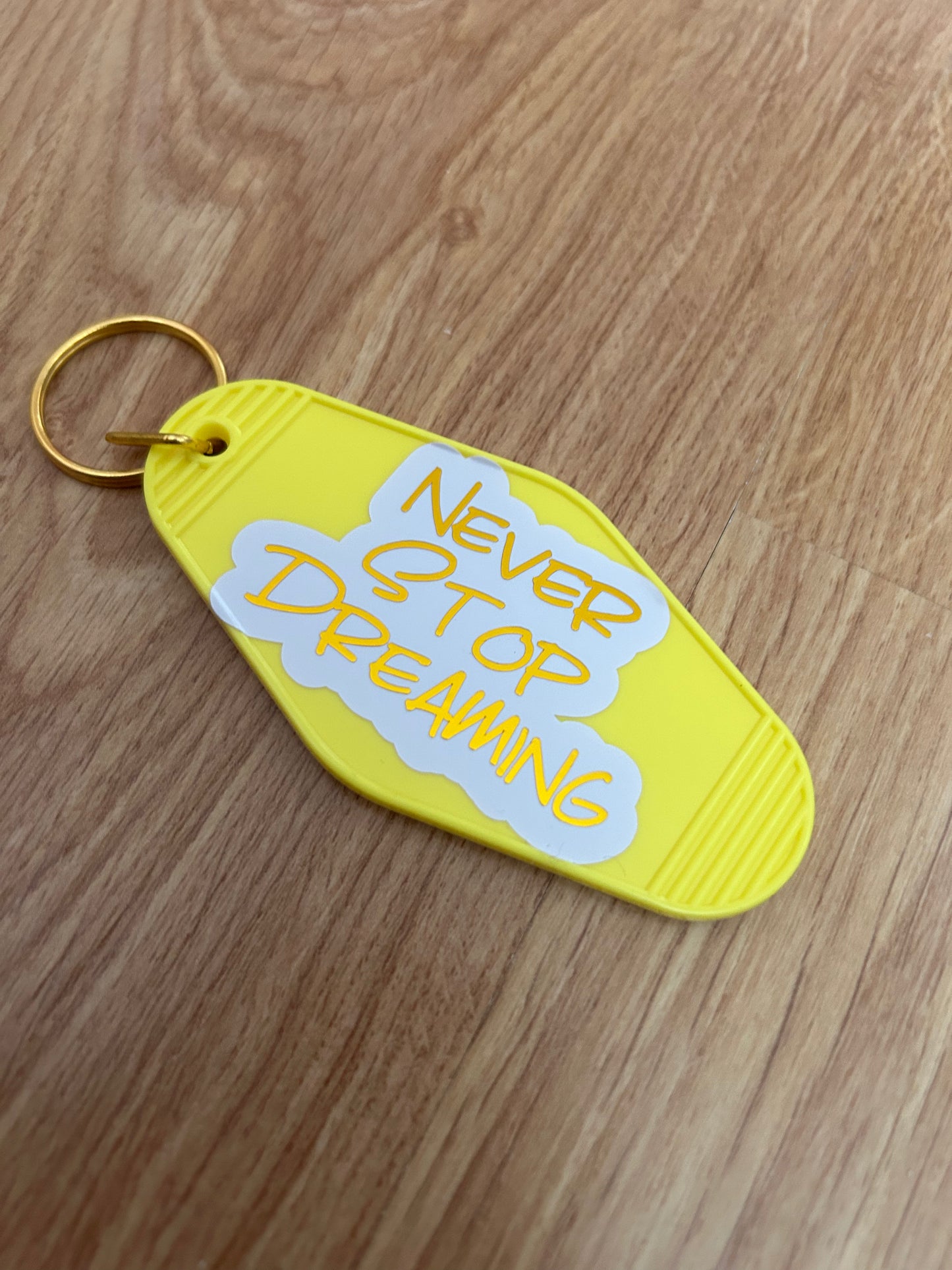 Never Stop Dreaming motel keyring