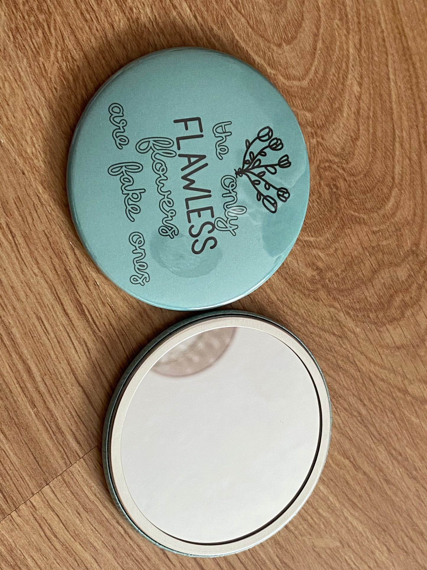 Flawless flower pocket mirror