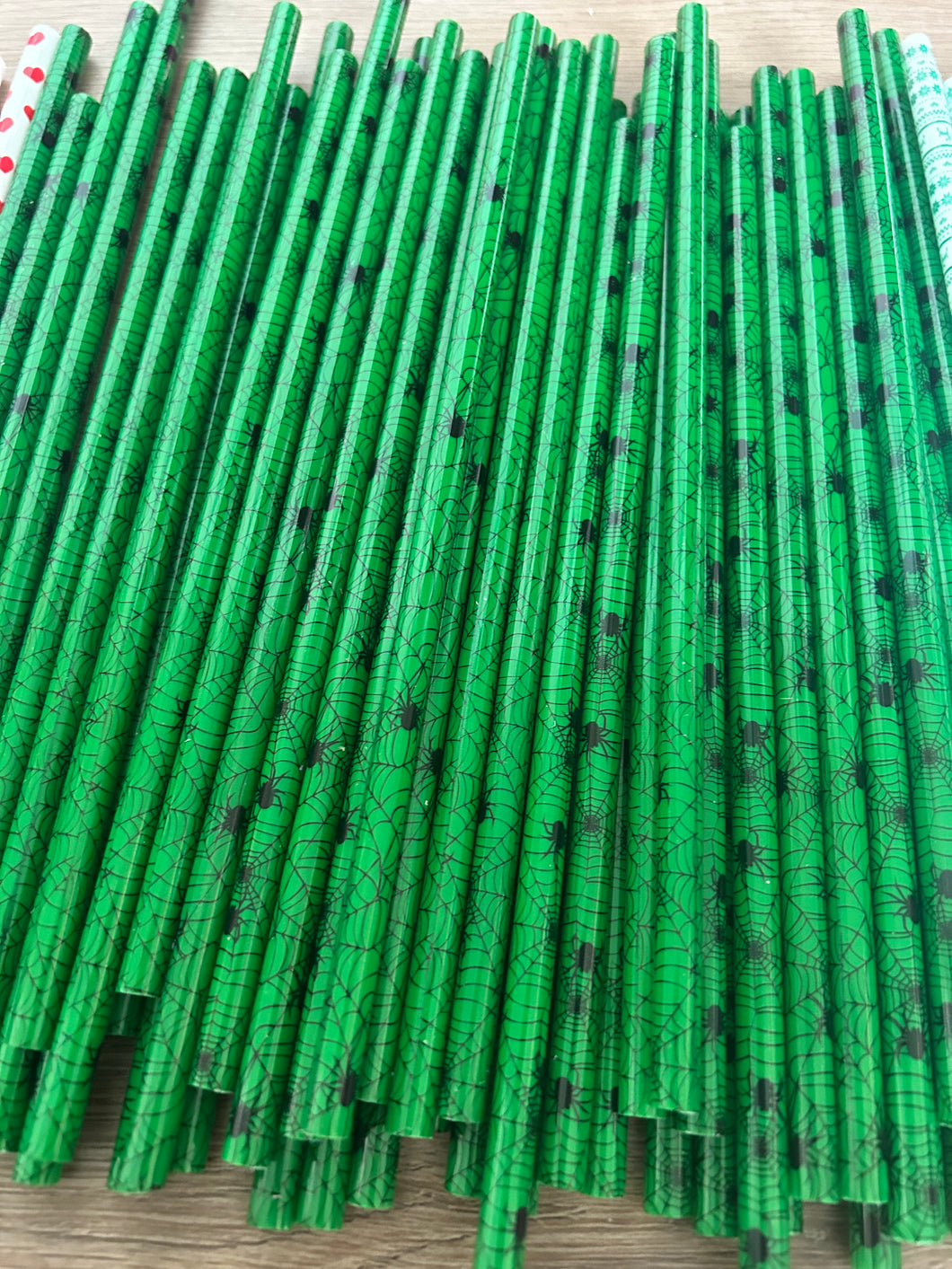 Plastic green with black spider halloween straws