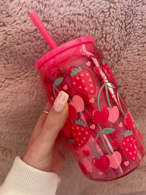 strawberry and cherry can with straw