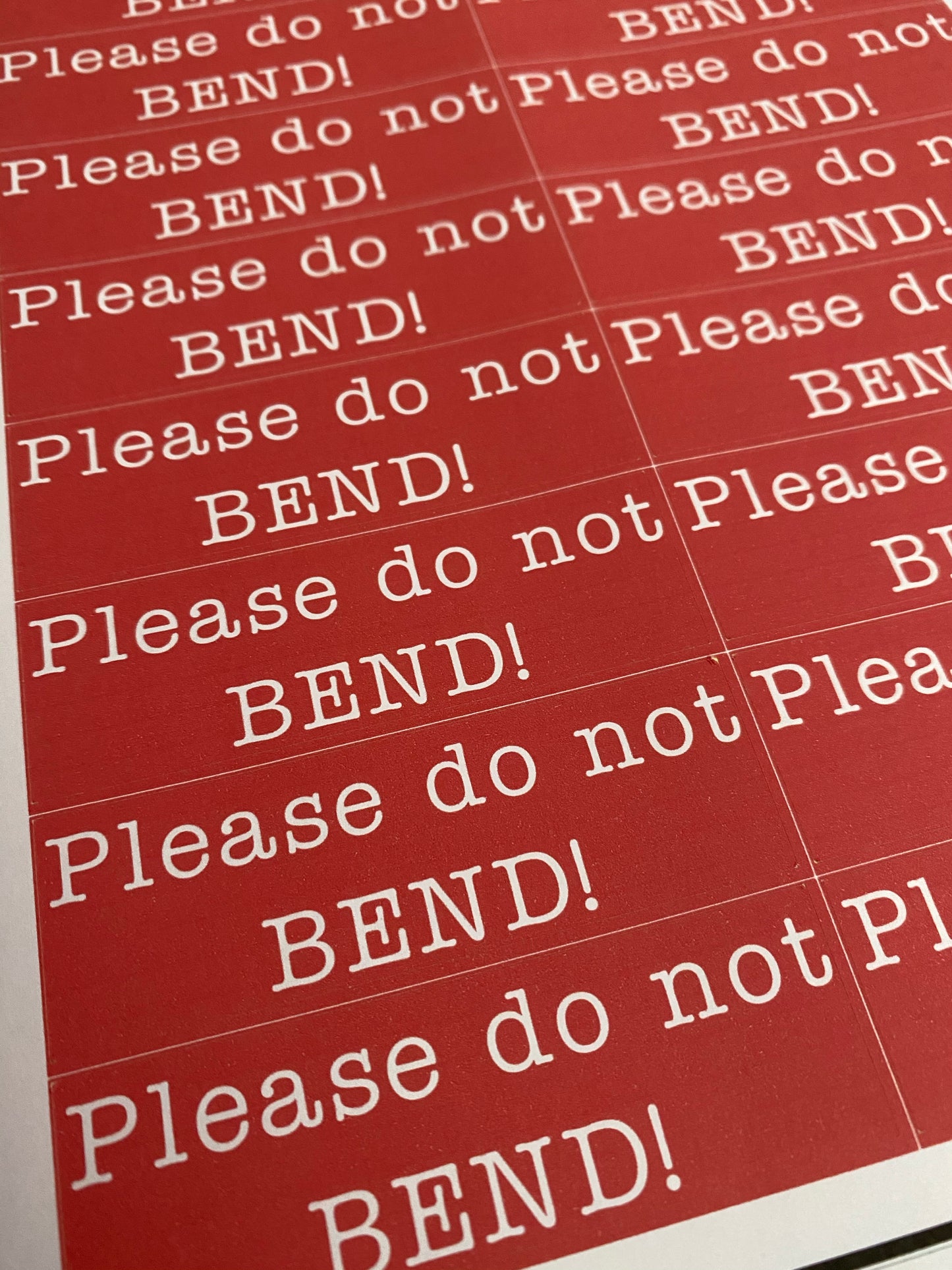 Please do not bend stickers